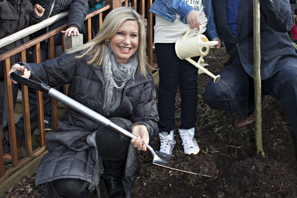 Olivia planting tree in Hyde Park  - Evening Standard
