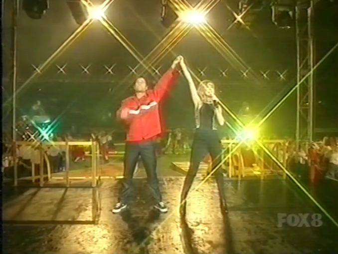 Olivia Newton-John and Jon Stevens at Super League Cup Grand Final September 1997 Olivia Newton-John Super League Cup Grand Final September 1997
